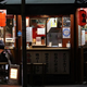 Two patrons enjoy some drinks in Osaka without, we hope, leaking sensitive information in the process.